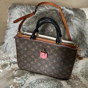 Nice LV style monogram handbag. No marks or stains. Carried once or twice.